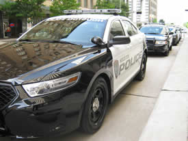 HPD's patrol vehicles with a black and white color scheme.