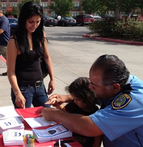 Houston police officers and members of the Greater Houston Loss Prevention Alliance (GHLPA) took time out of their schedules today (May 3) to fingerprint children and offer safety tips to shopping parents at Target on 2580 Shearn. 