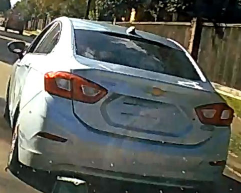 Vehicle of interest with damage visible